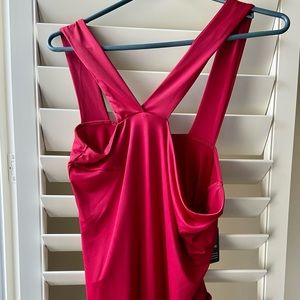 EXPRESS Thong Body Suit BNWT. Size Large Asymmetrical straps. Red. Snaps.